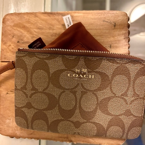 Coach Wristlet in Signature Canvas. - Picture 6 of 10